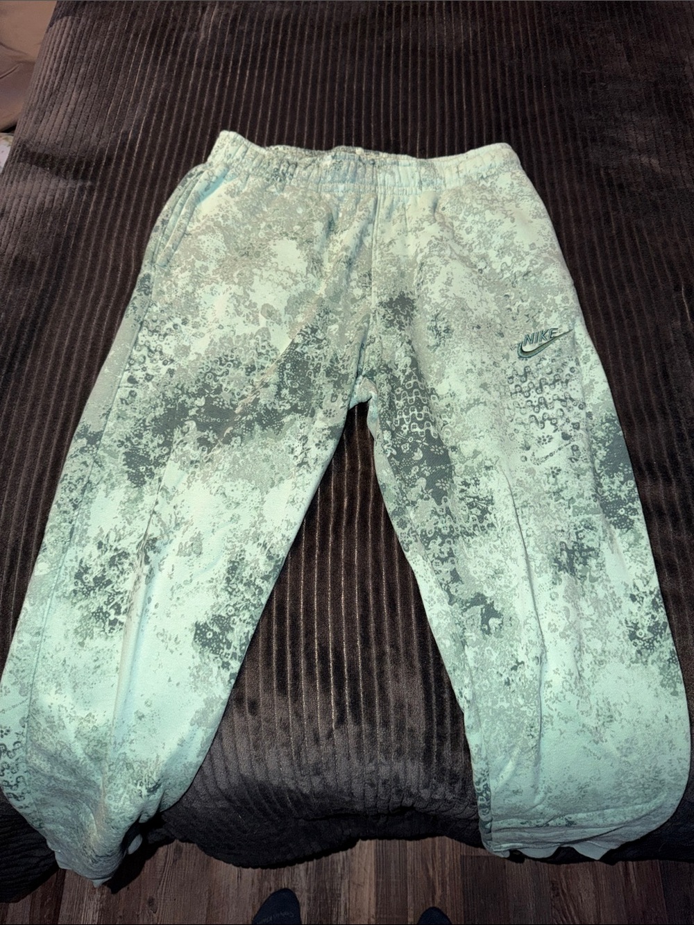 Nike Mint Green Patterned Joggers with Subtle Dark Accents